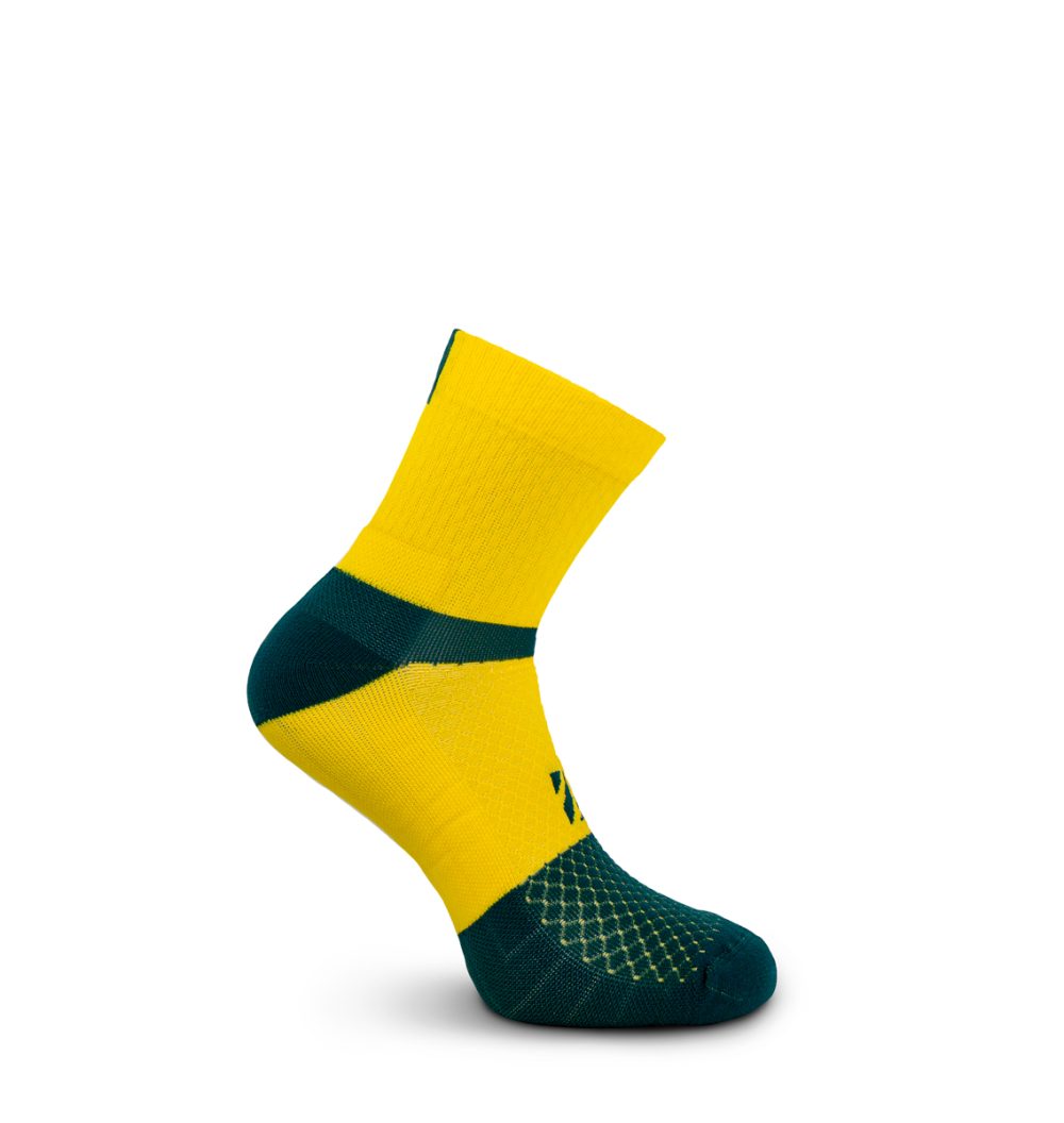 Calcetines antiampollas técnicos para running de color amarillo y verde. Ideales para correr largas distancias y maratón.